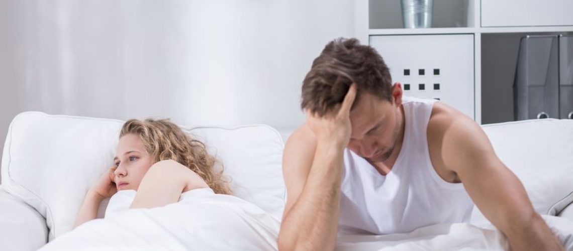 49175548 - couple is lying in bed upset after argument